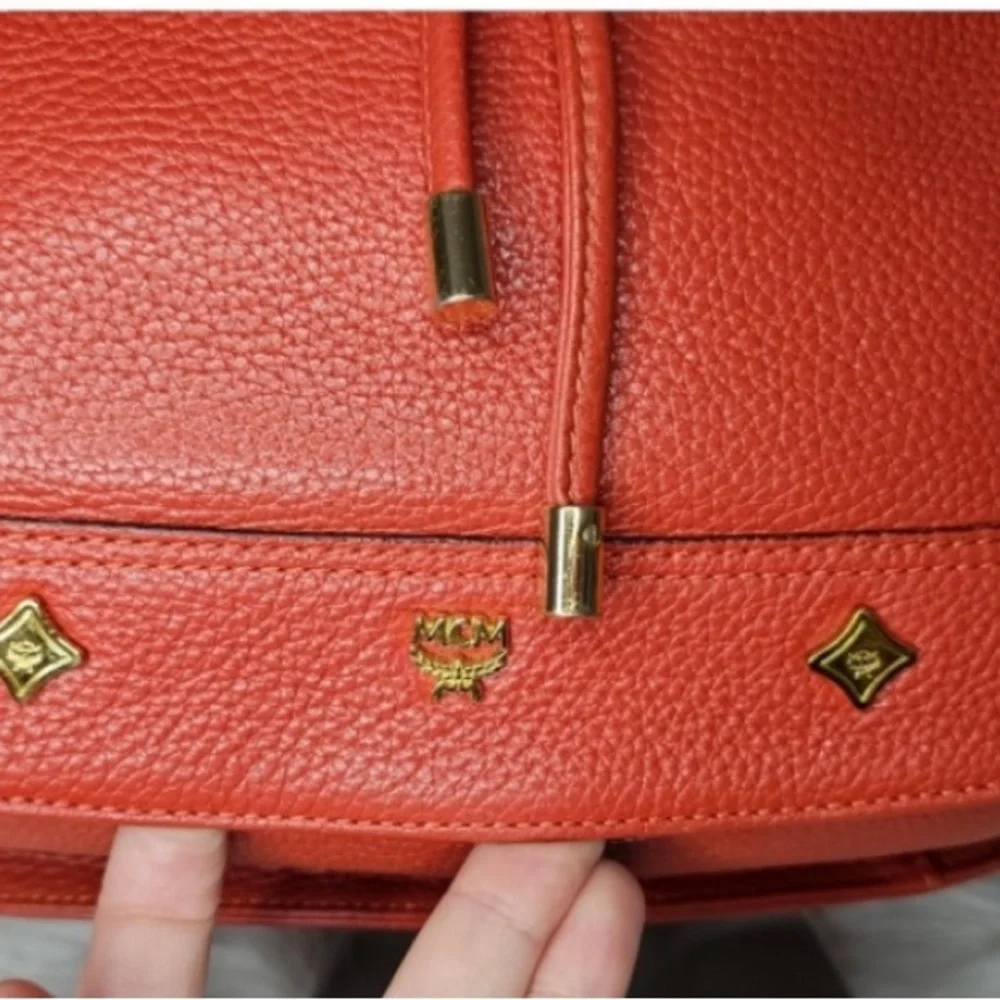 MCM 2 Way Motif Leather Drawstring Bucket Bag